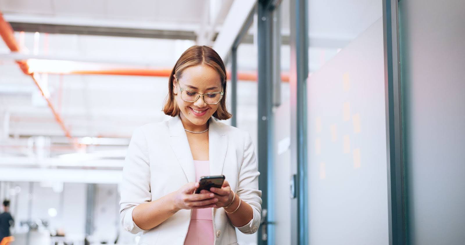 Women using phone to access digital wallet