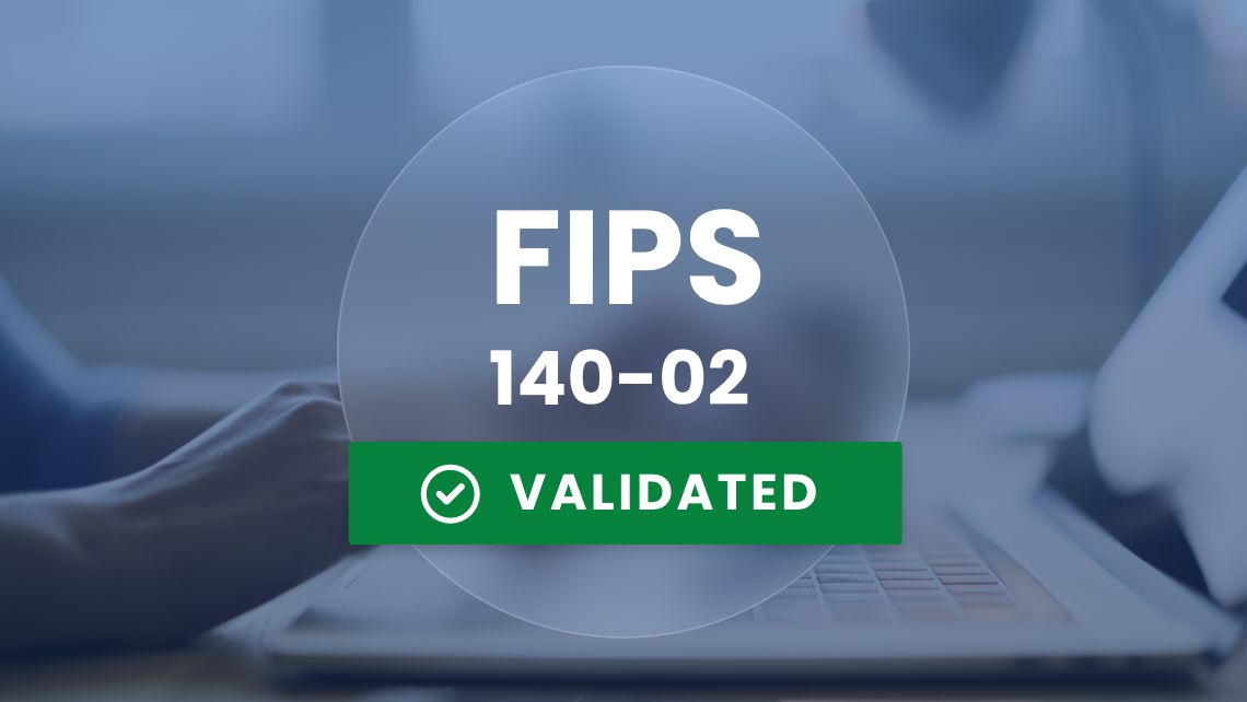 Person typing on laptop with FIPS 140-02 validated badge overlay