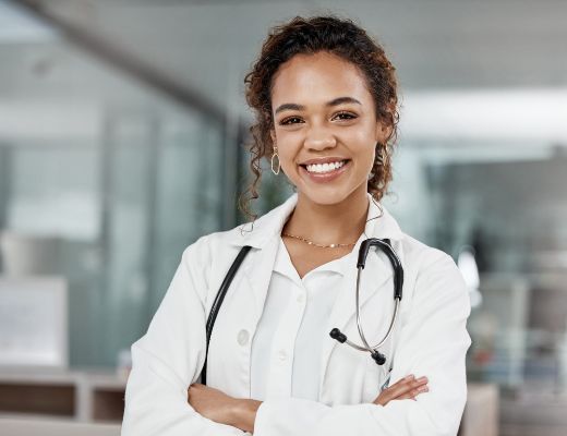 Smiling female doctor with stethoscope around her neck