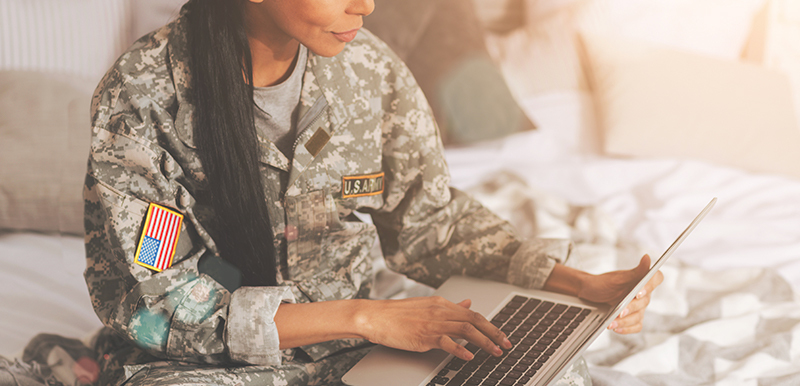 Military woman on laptop